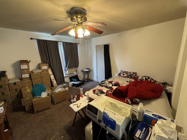 carpeted bedroom featuring ceiling fan, cooling unit, and a textured ceiling