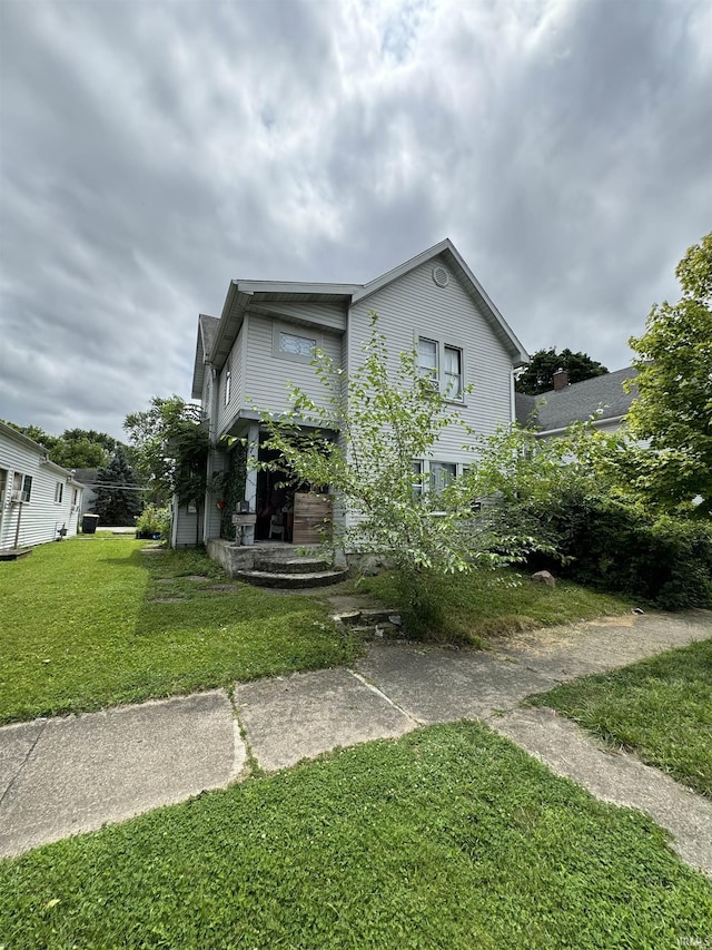 exterior space with a front yard