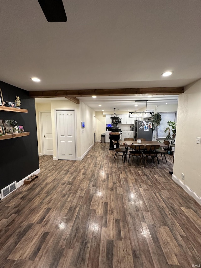 dining area with dark hardwood / wood-style floors