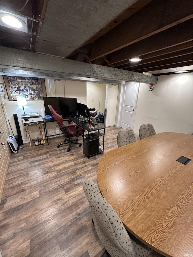 home office with wood-type flooring