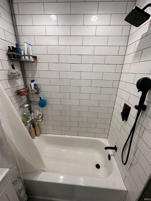 bathroom featuring shower / tub combo with curtain