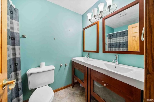 bathroom featuring vanity, mail boxes, and toilet