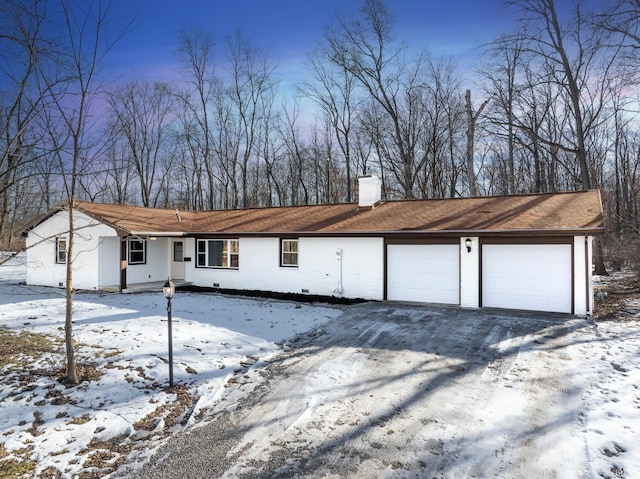 ranch-style house with a garage