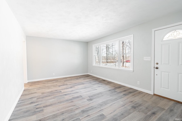 foyer entrance featuring light hardwood / wood-style floors