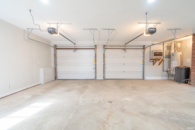 garage with a garage door opener and gas water heater