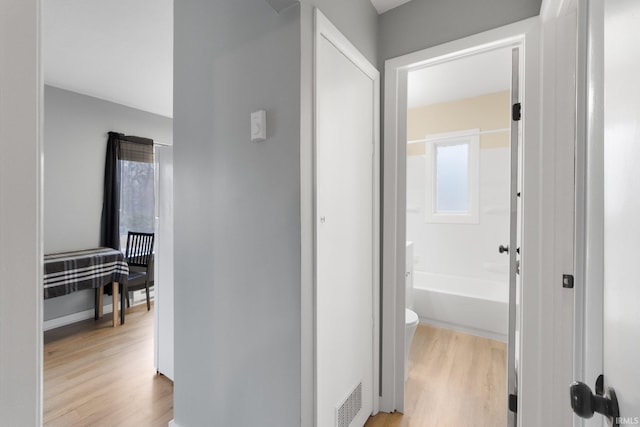 hall featuring light hardwood / wood-style flooring