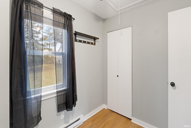 entryway with wood-type flooring