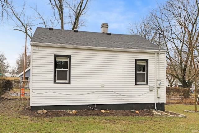 view of home's exterior featuring a yard