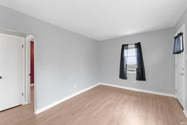 empty room with light wood-type flooring