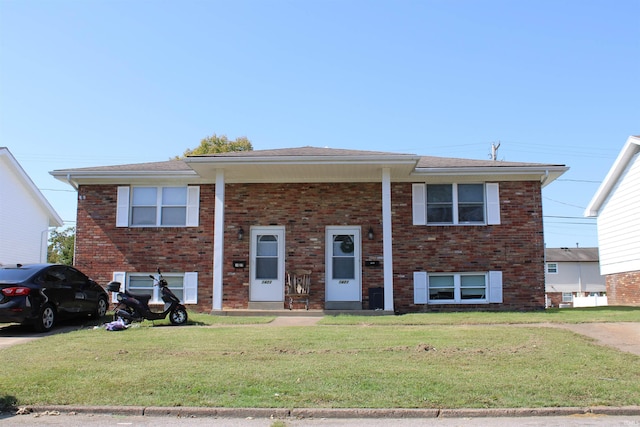 view of front of home with a front yard