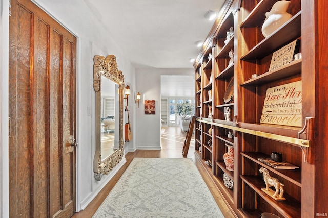 wine cellar with light wood-type flooring