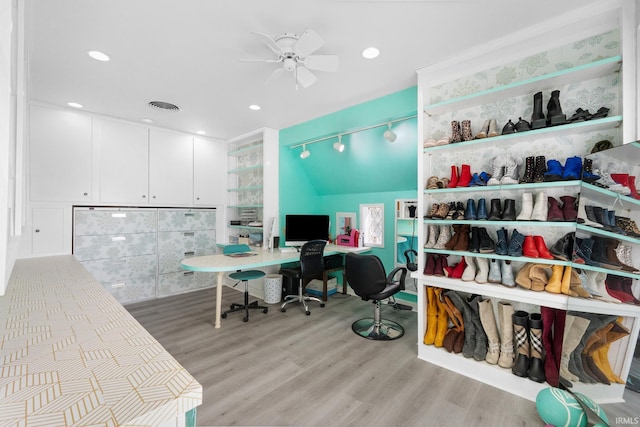 home office featuring ceiling fan and light wood-type flooring