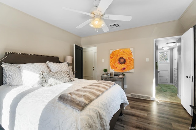 bedroom with dark wood-type flooring and ceiling fan