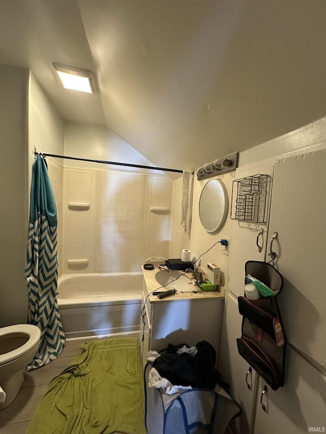 bathroom with shower / tub combo with curtain, lofted ceiling, toilet, and tile patterned flooring