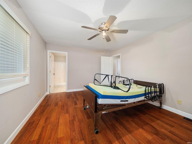 bedroom featuring dark hardwood / wood-style flooring