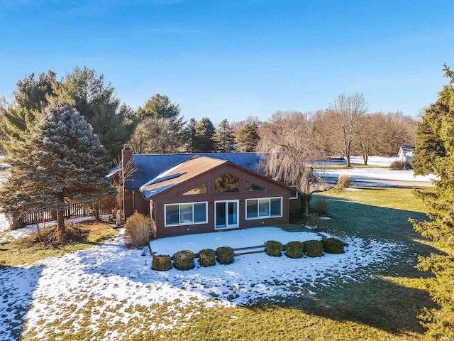 view of front of home featuring a yard