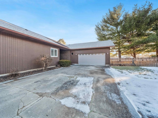 exterior space with a garage