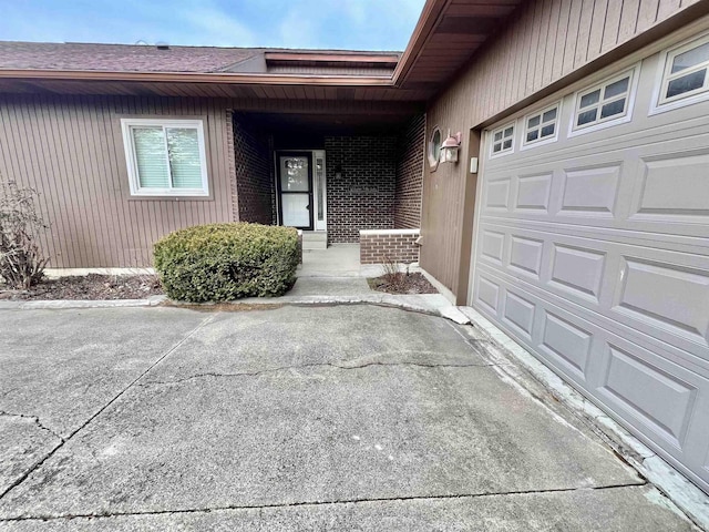 entrance to property featuring a garage