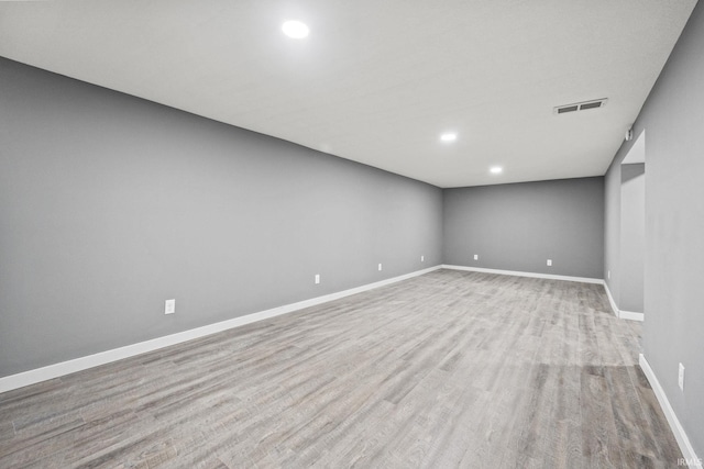 unfurnished room featuring light hardwood / wood-style flooring