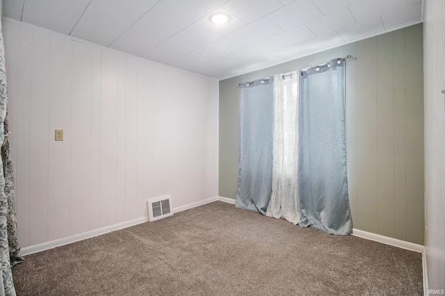 unfurnished room featuring carpet floors