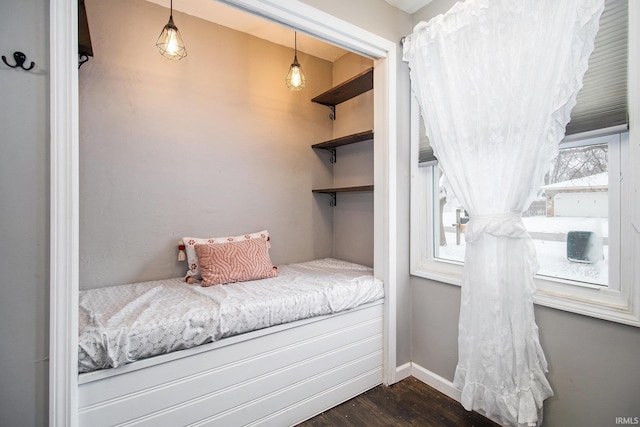 bedroom featuring dark hardwood / wood-style flooring