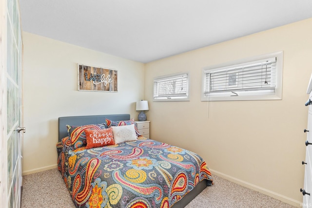 bedroom with light carpet