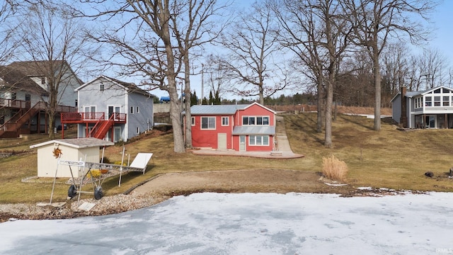 exterior space featuring a shed and a deck