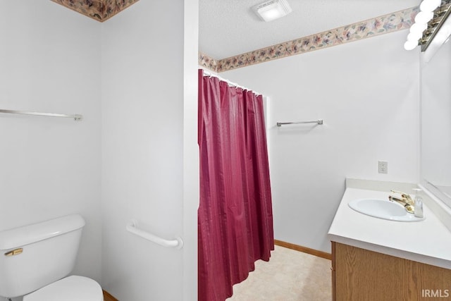 bathroom featuring vanity, a shower with shower curtain, a textured ceiling, and toilet