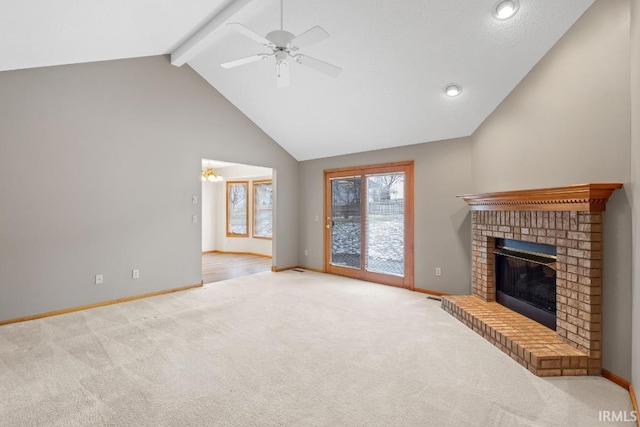 unfurnished living room featuring ceiling fan, high vaulted ceiling, a brick fireplace, light colored carpet, and beamed ceiling