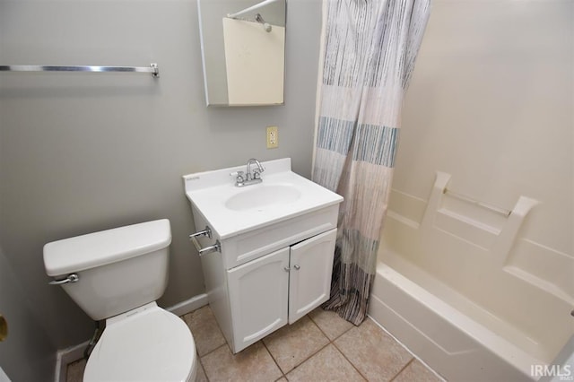 full bathroom featuring vanity, tile patterned floors, shower / bath combination with curtain, and toilet