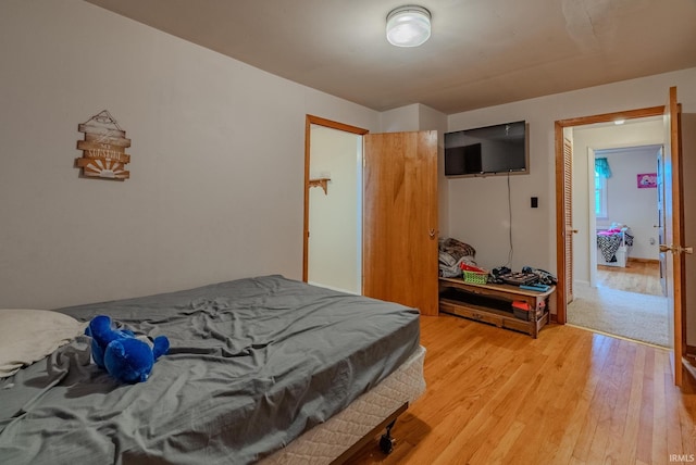 bedroom featuring light wood-type flooring