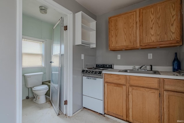 kitchen featuring sink and white electric range