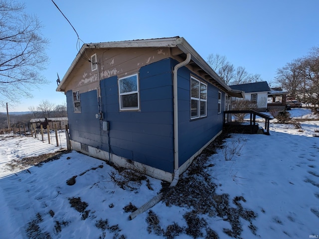 view of snow covered property