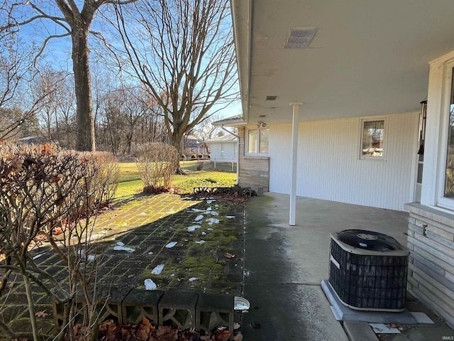 view of patio / terrace with central AC unit