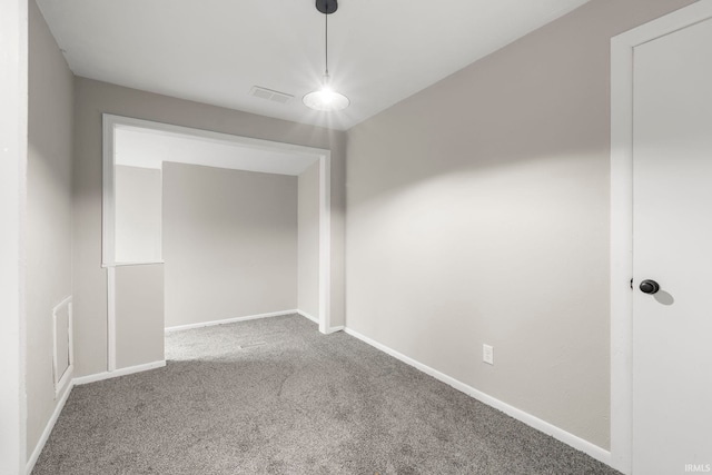 unfurnished room featuring carpet floors