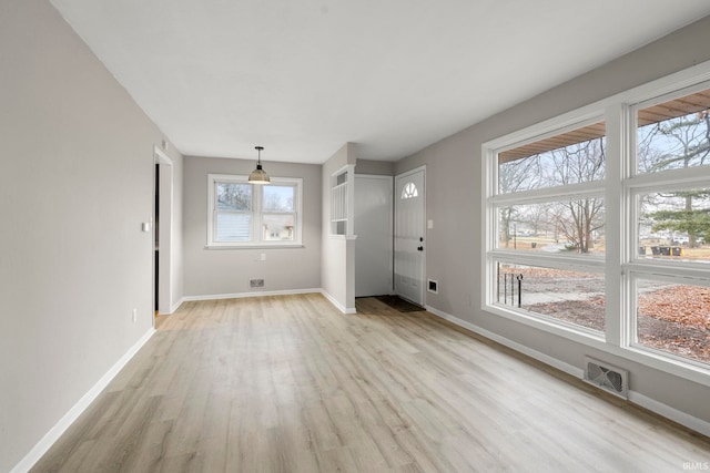 interior space with light hardwood / wood-style floors