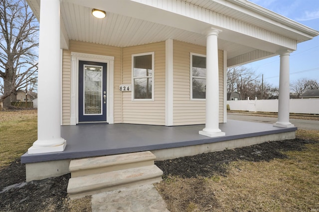 property entrance with covered porch