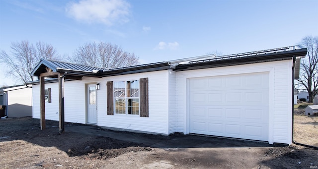 exterior space with a garage