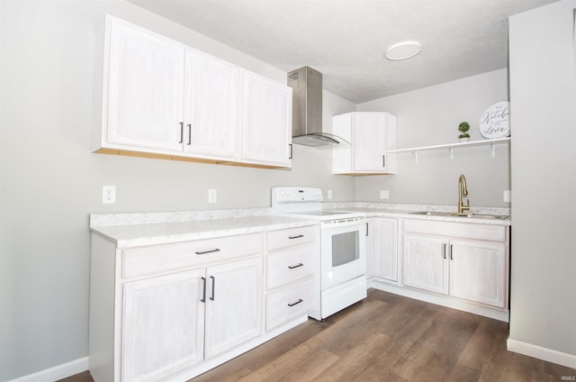 kitchen featuring sink, electric range, dark hardwood / wood-style floors, white cabinets, and wall chimney exhaust hood