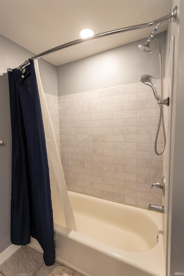 bathroom featuring shower / bathtub combination with curtain