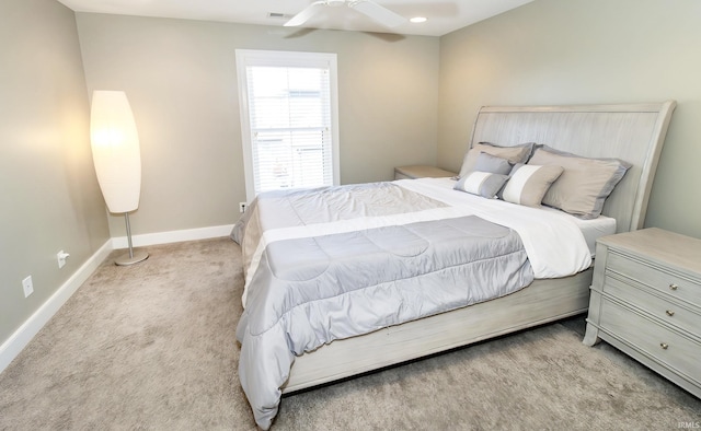 bedroom with light colored carpet