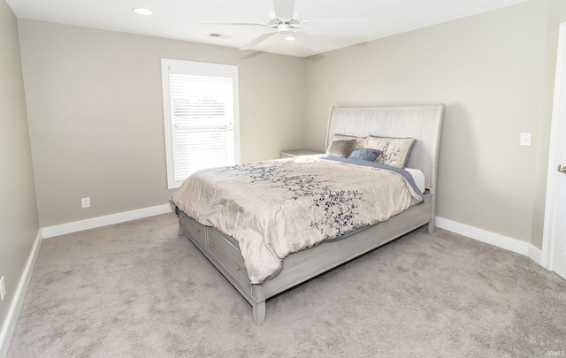 carpeted bedroom with ceiling fan