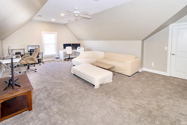 office with vaulted ceiling, ceiling fan, and carpet floors