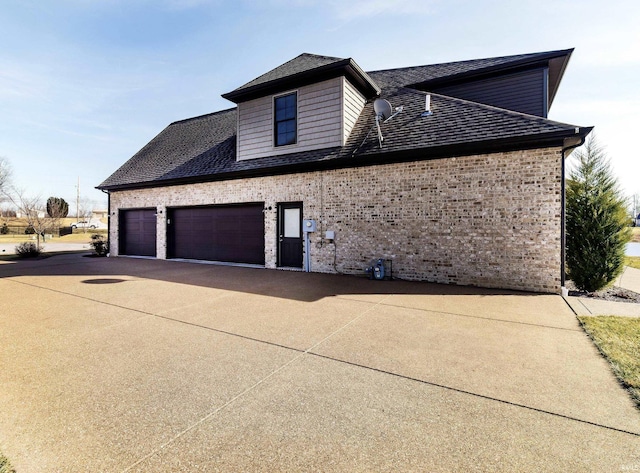 view of property exterior with a garage