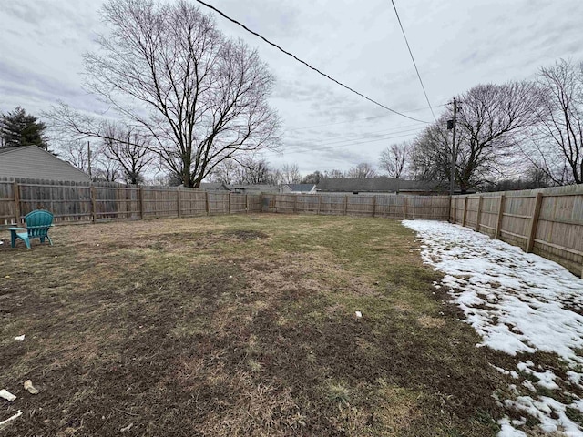 view of yard covered in snow