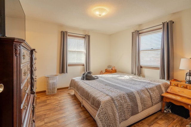 bedroom featuring light hardwood / wood-style flooring