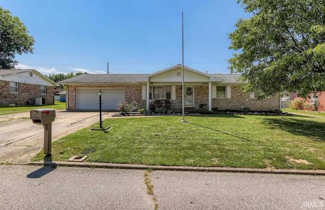 ranch-style home with a garage and a front lawn