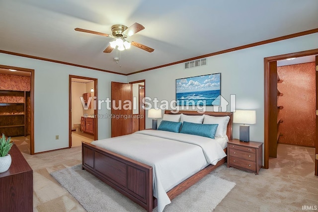 carpeted bedroom featuring crown molding, connected bathroom, and ceiling fan