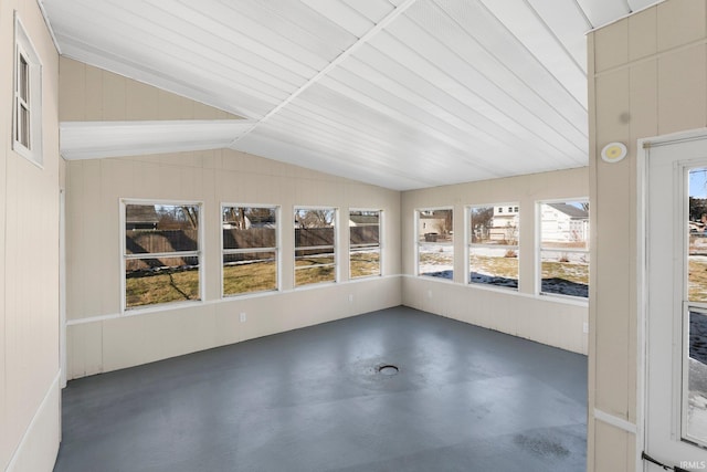 unfurnished sunroom with lofted ceiling