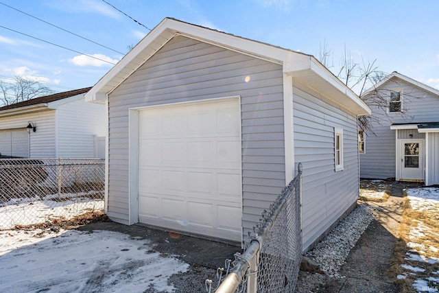 view of snow covered garage